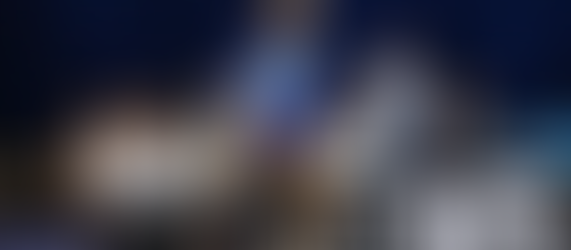 Athlete Jordan Chiles standing on the floor during her floor routine yelling.