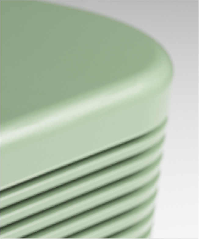 image of side of green speaker on grey background