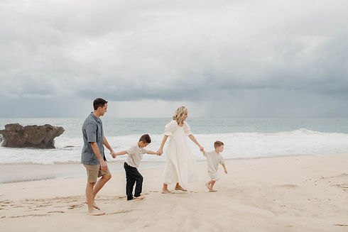 family walking on beach