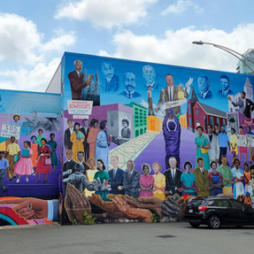 Large colorful mural in downtown durham.