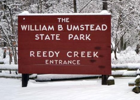 Umstead Reedy Creek entrance sign in snow