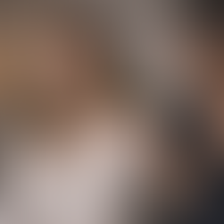 A female therapist comforting an adult female patient