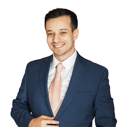 Misha Vilenchuk wearing a blue suite with a smile on his face