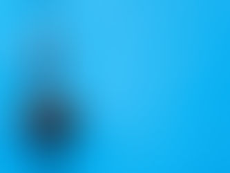 Image: Open pad lock on blue door background. Article: Three Coaching Skills that Unlock Forward Action: Brainstorming, Requesting, and Challenging. Explore how coaching tools like brainstorming, requesting, and challenging deepen learning and forward action—core to the Co-Active approach.