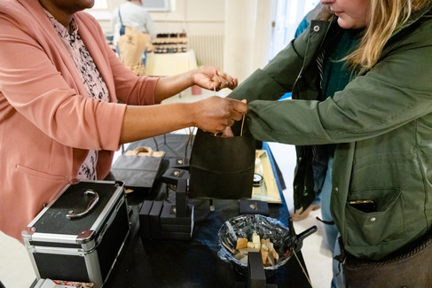 two women at an indoor artisan market