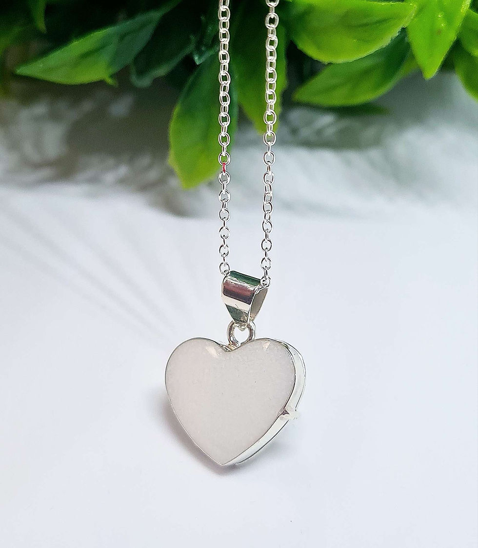 Thumbnail: Sterling silver breastmilk locket necklace with heart-shaped resin front, displayed in jewellery box with 18" chain.