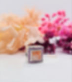 Square diamanté bracelet charm made with preserved breastmilk in resin, sterling silver setting with rose gold leaf