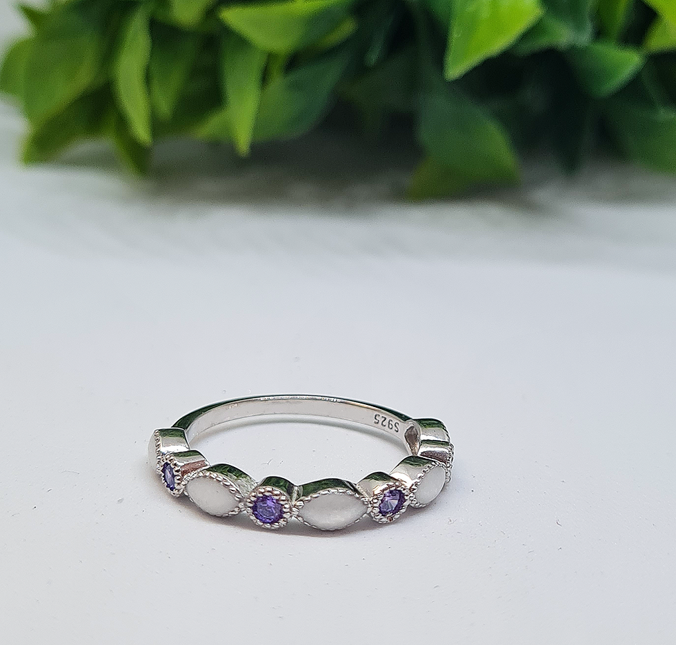 Thumbnail: Lyra breastmilk birthstone ring with multiple stone settings