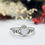 Thumbnail: Breastmilk keepsake ring with crowned heart bezel and traditional Claddagh design