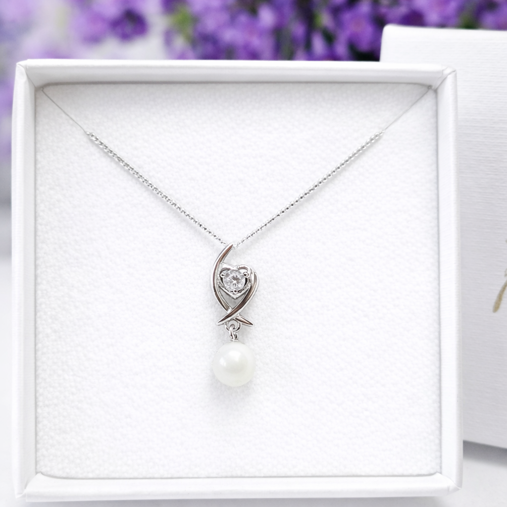 Pearl necklace with diamante heart drop pendant