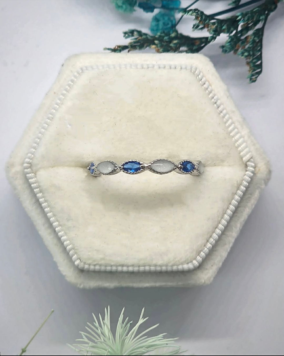Thumbnail: Aditi breastmilk birthstone eternity ring with marquise crystal accents