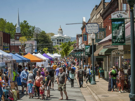 Visitors enjoying a street festival in Sylva, NC
