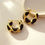 Thumbnail: Gold Tone Black Enamel Hoop Fashion Earrings Metal Continuous Closure
