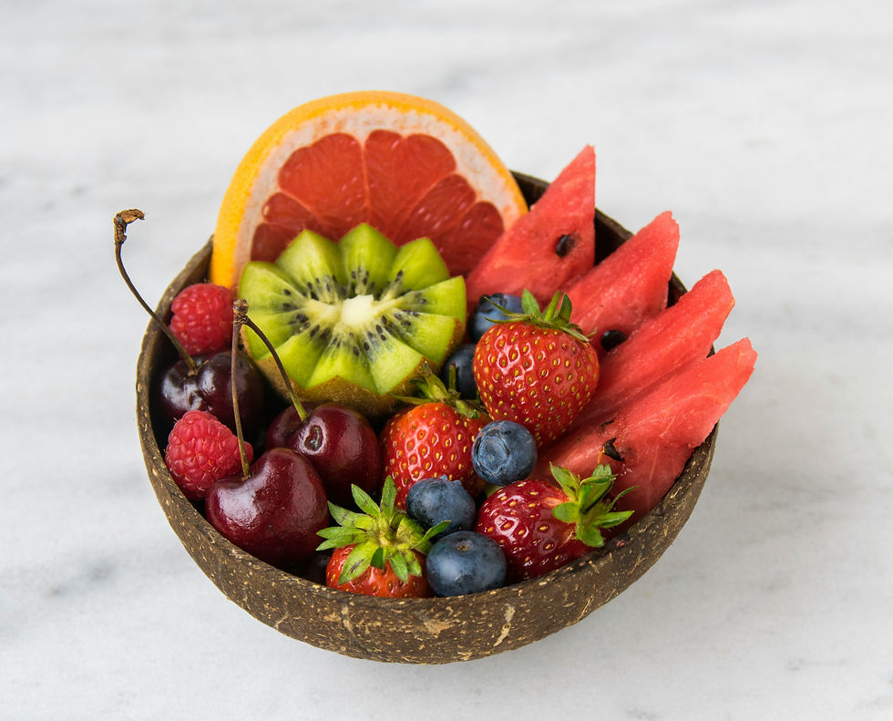 Close-up view of vibrant fruit slices arranged on a wooden surface