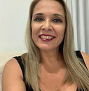 Foto de mulher sorrindo.