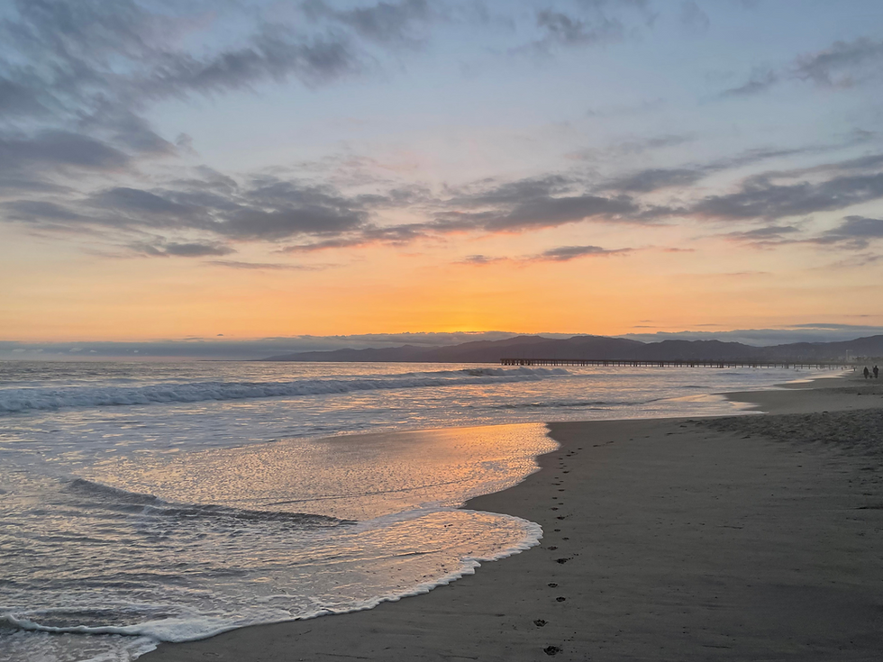 Sunset over ocean beach
