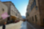 Paving stones polished by centuries of footsteps