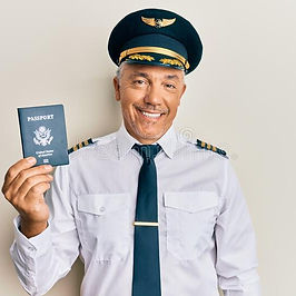 handsome-middle-age-mature-pilot-man-holding-usa-passport-looking-positive-happy-standing-
