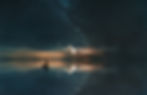 A boat sails under a star-filled sky