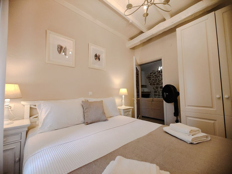 Traditional stone villa surrounded by olive trees in North Corfu.