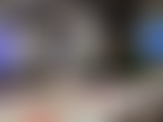 Creative wellbeing workshop space set up with tables, art materials and resources for children and families