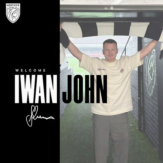 Iwan John signs!