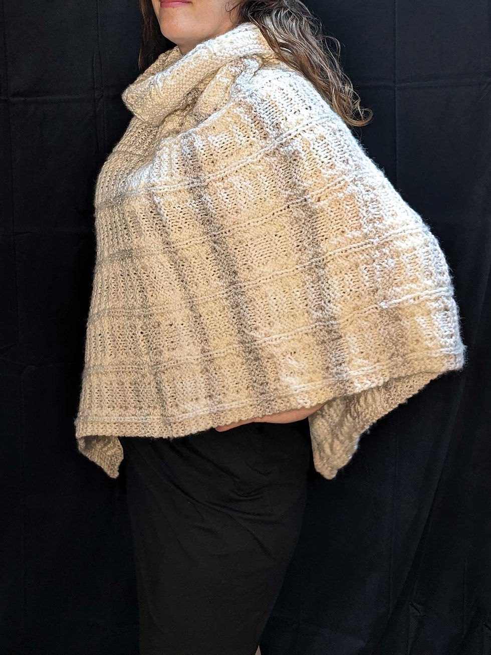 Thumbnail: Knitted Cuddly Poncho - Asymmetrical, side view, 100% Acrylic, Color: Quartz with subtle stripes, Special Features:  Very soft, asymmetrical drape, cowl collar, cable knit, JordynCherise