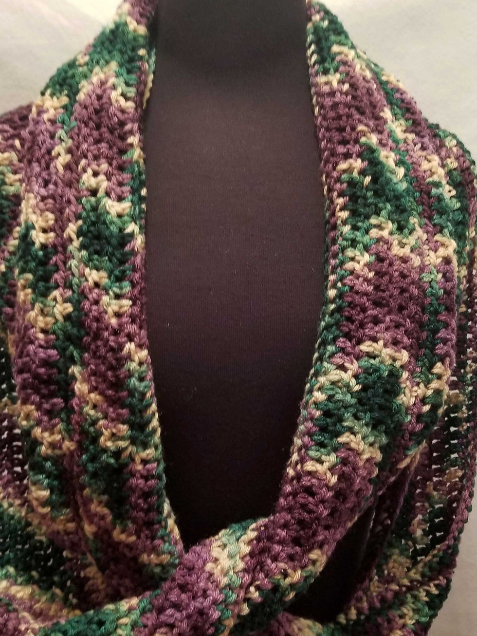 On and On Infinity Scarf - Crochet Green, Purple, Tan loosely wrapped detail