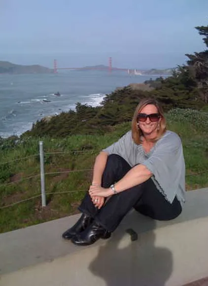 Author Sue Fliess with the Golden Gate Bridge in the background