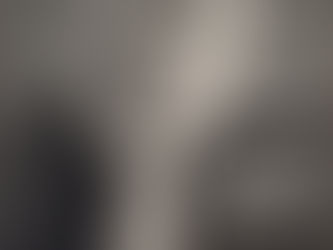 A young Japanese woman in a white furisode with Baroque palace motifs and gold leaf, photographed at her coming-of-age ceremony in 1950s Tokyo.