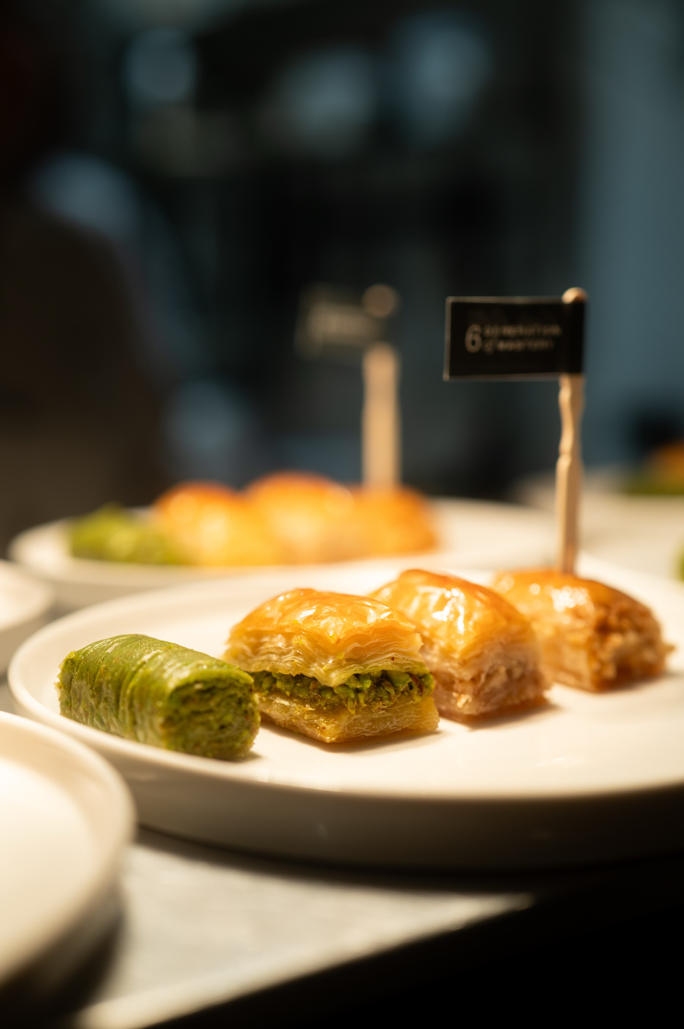 Close-up of assorted pastries on a white plate.