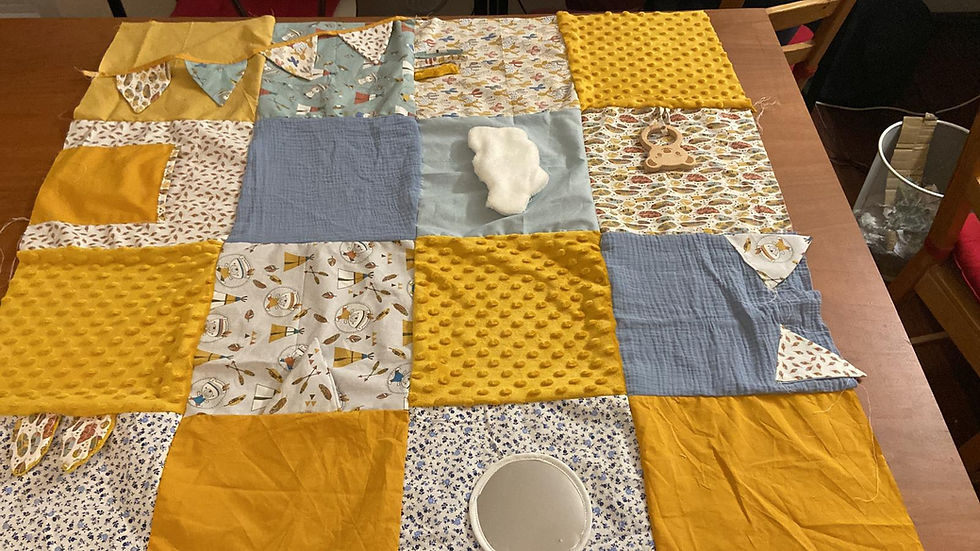 tapis d'éveil en cours de couture