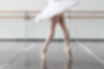 Ballet dancer on Pointe and Whote Practice Tutu