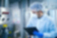 technologist-expert-protective-uniform-with-hairnet-mask-taking-parameters-from-industrial