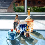 A collection of drinking implements and bottles of Alcohol.
