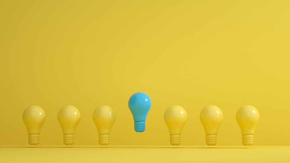 Eén blauwe lamp tussen zes gele lampen – symbool voor valkuilen en afwijkende keuzes tijdens de budgetronde.