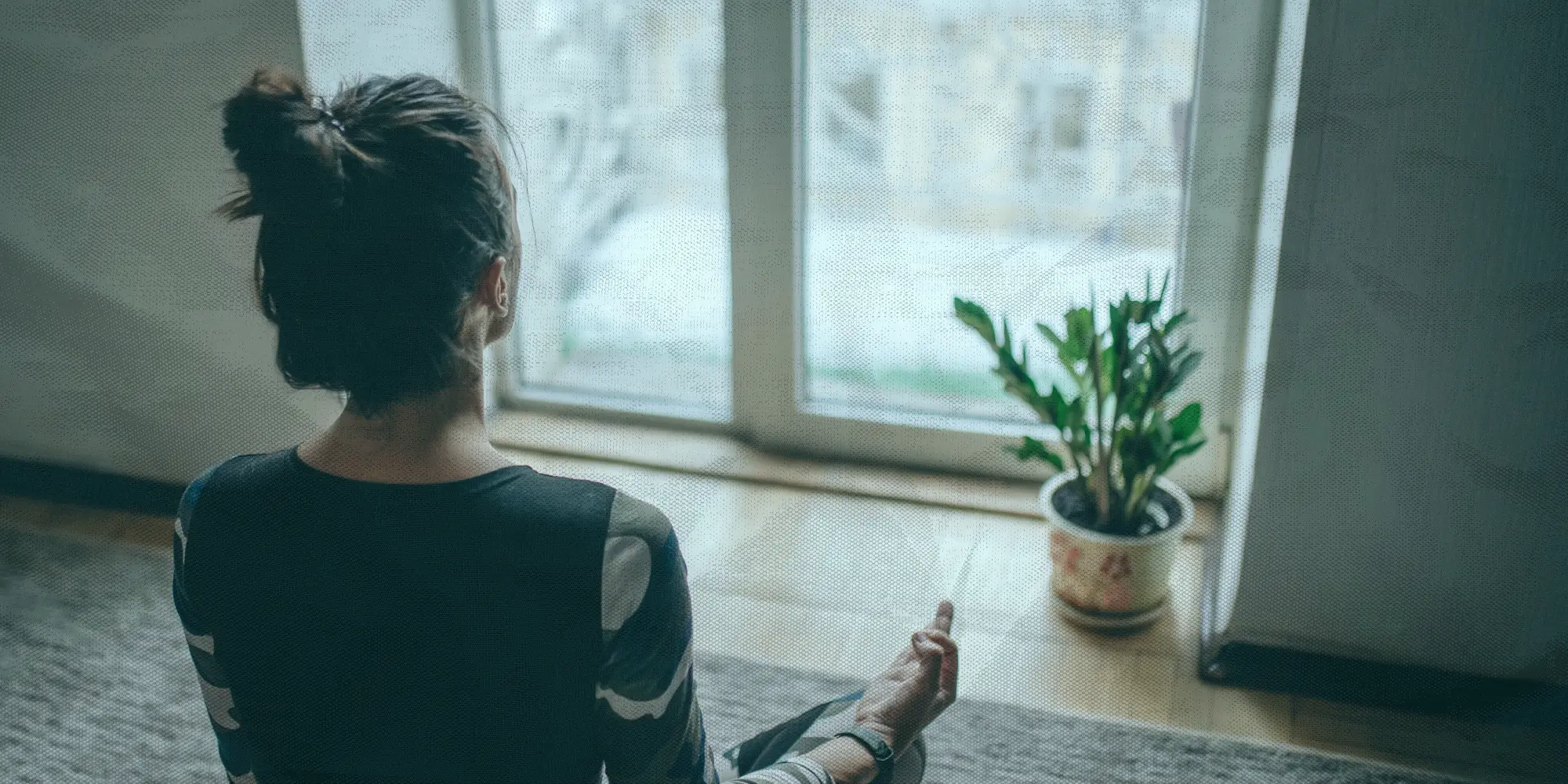 A woman doing some mindful exercises - meditating