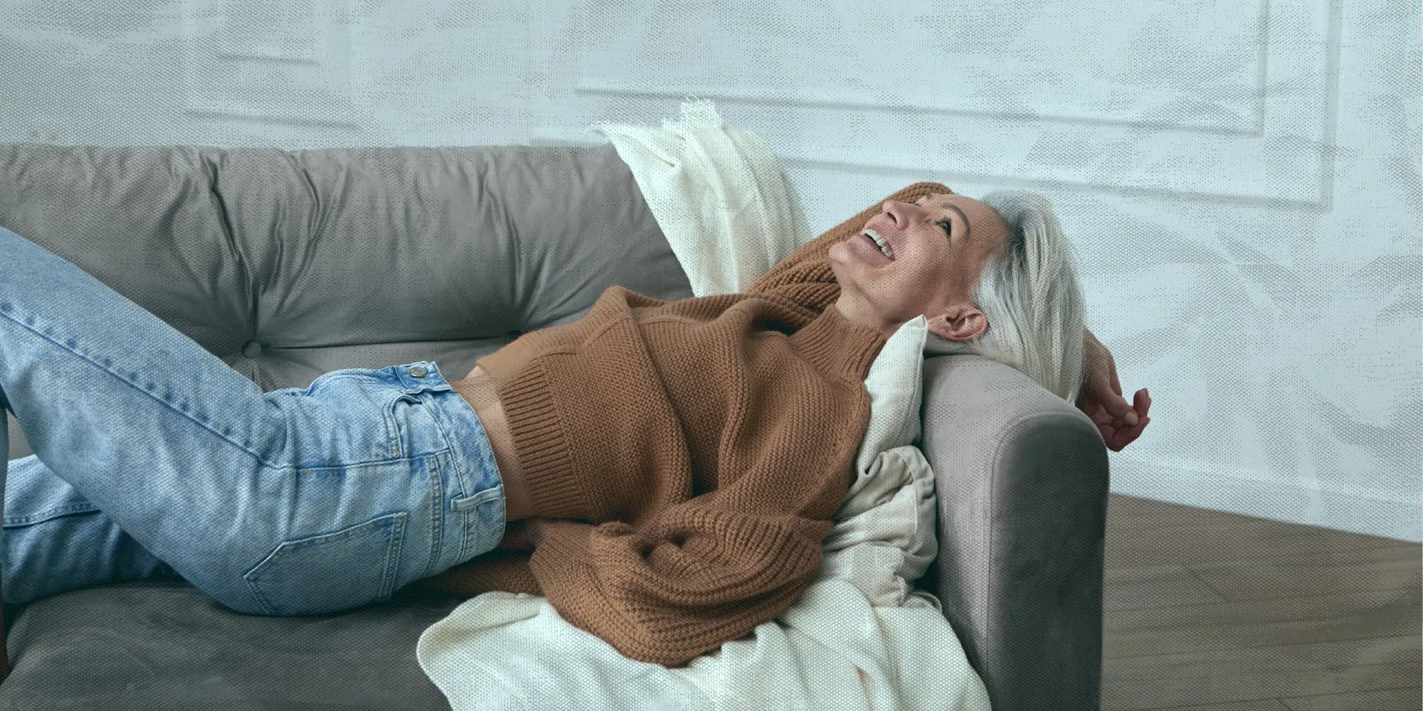 What To Do This Weekend | Health SZN | A smiling woman doing a a body scan sitting on a couch