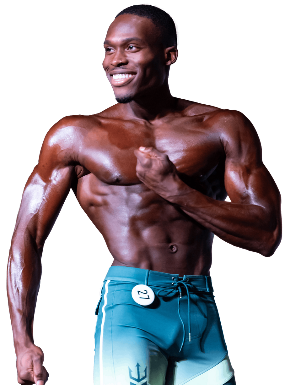 Muscular man flexing bicep, smiling