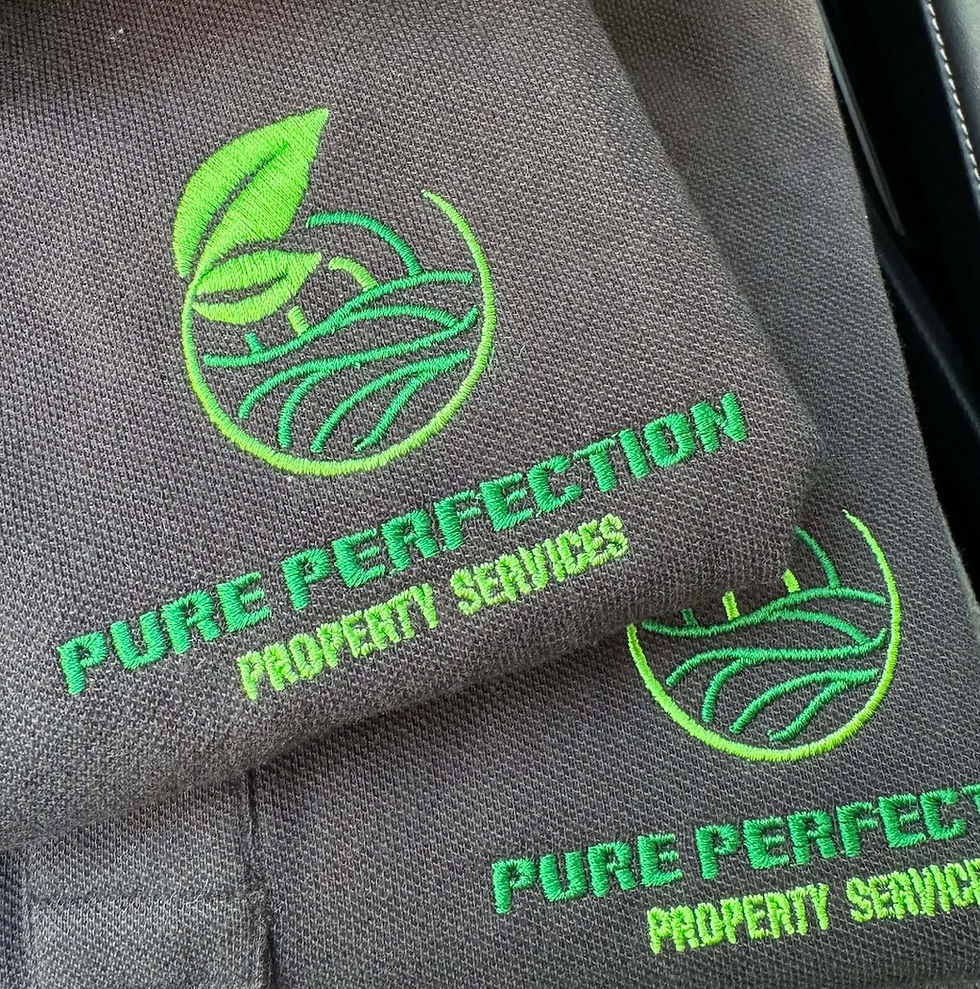 green embroidered logo on a dark gray fabric