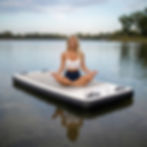 Thumbnail: Enjoy a relaxing yoga session on a sturdy floating exercise platform on a calm blue lake.