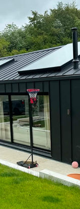 Greencoat PLX jet black standing seam roofing and cladding 