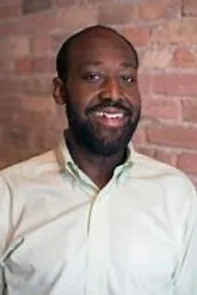 Keron Blair white shirt.webp