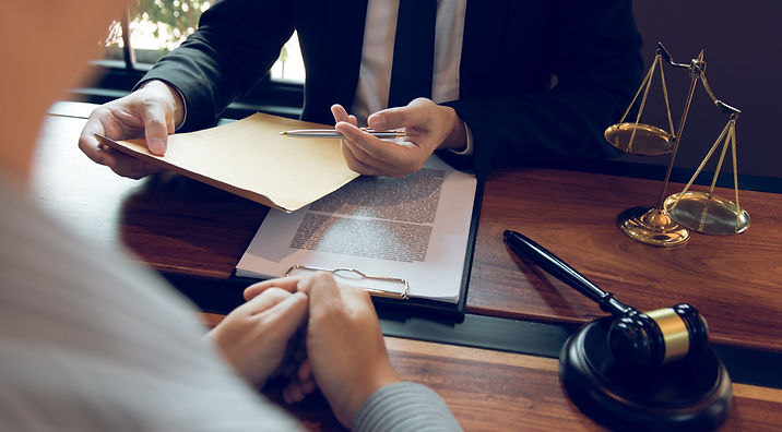 Lawyer-In-Meeting-with-Male-Client-shutterstock_1833158881.jpg