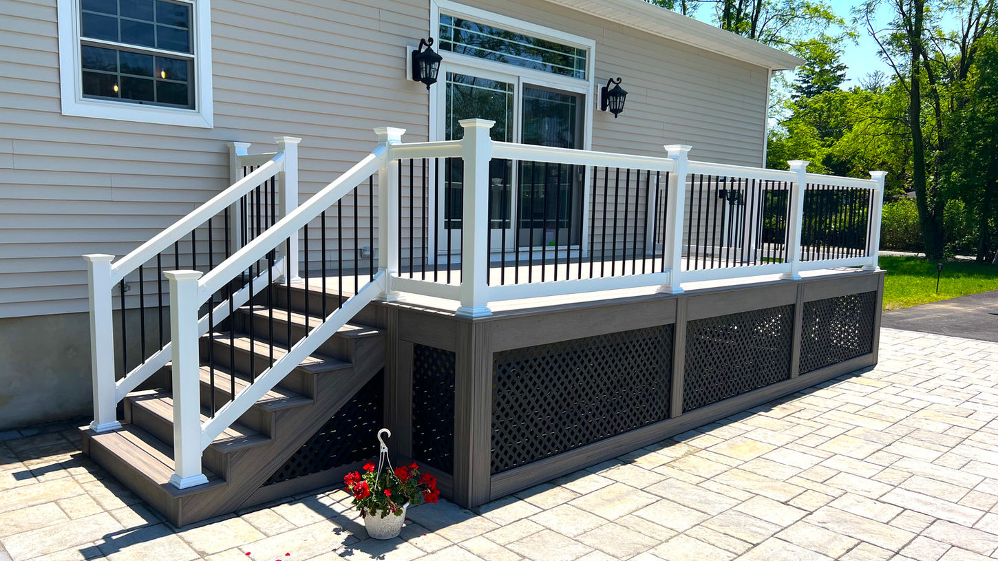 Small deck off the back of a house