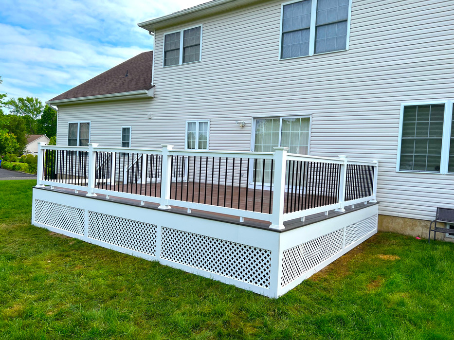 util_construction_new_deck_with_fiberon_decking_and_white_lattice_skirting_in_north_brunswick