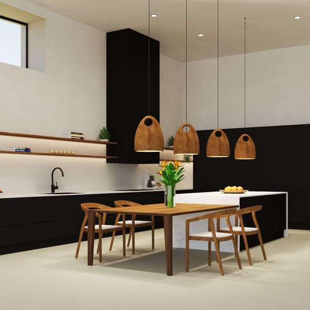 Diseño de cocina abierta en casa en Barcelona, con mobiliario de color gris antracita y porcelánico blanco con vetas grises. Cocina de gran tamaño en forma de L con isla central que incluye una mesa para comidas rápidas y una despensa oculta. Proyecto de diseño realizado por ABACUBE Interiorismo & Decoración.