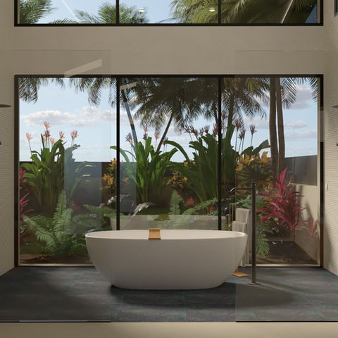 Baño completo de diseño de lujo en Barcelona por ABACUBE Interiorismo & Decoración, con vistas al jardín, techos altos y cristaleras de suelo a techo. Bañera exenta y 2 duchas independientes. Lavabos separados e independientes, cabina de inodoro independiente, luz natural y jardines balineses. Spa en tu casa, un momento de relax de alto standing con vistas al jardín.