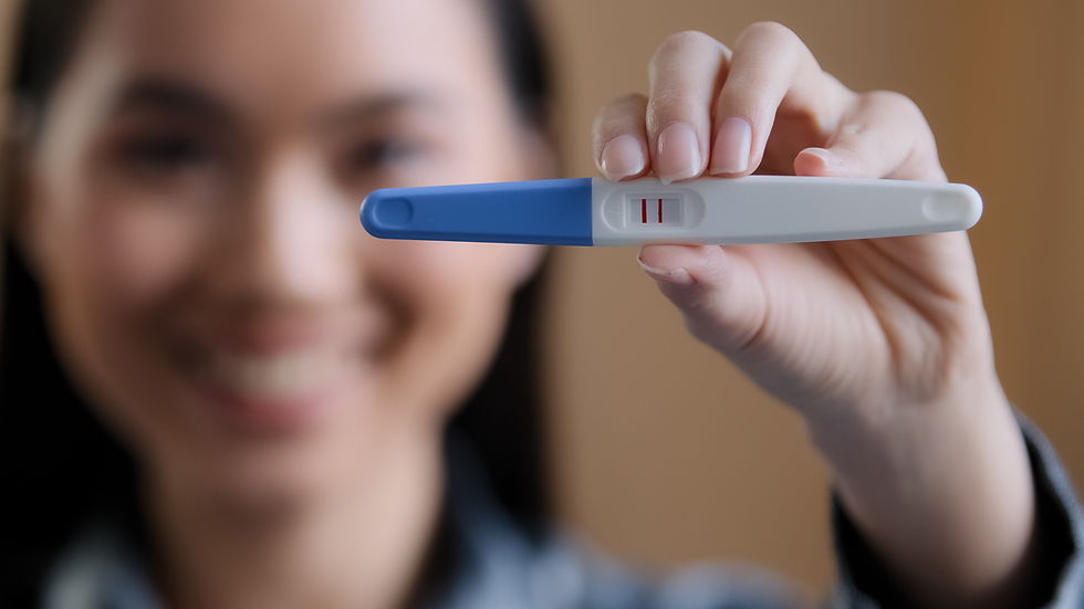 Happy fertility patient showing she doesn't have Infertility or inflammation