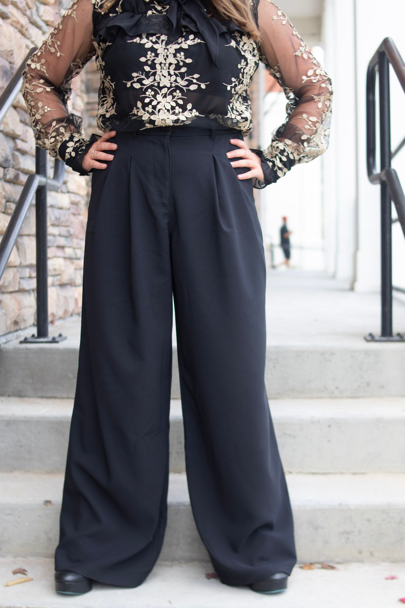 High waisted pleated wide leg trousers